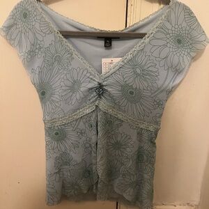 Weston Wear short sleeve light blue and green print size medium with brooch